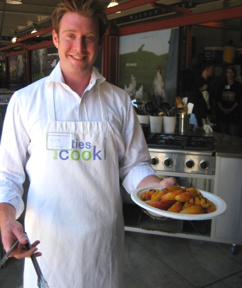 One of our Lunch Hour Chefs shows off some freshly grilled peaches.